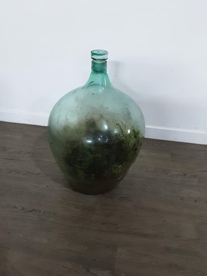 Lot 302 - A GLASS CARBOY