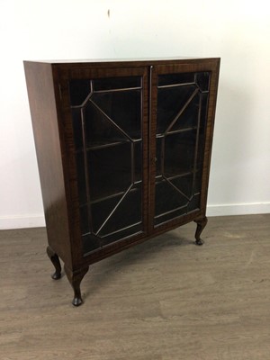 Lot 284 - A GLAZED TWO DOOR BOOKCASE AND A BEDSIDE CABINET
