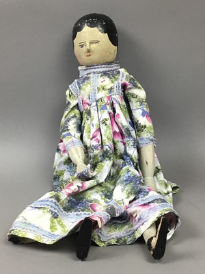 Lot 374 - A MID 20TH CENTURY PAINTED WOOD DOLL AND THREE OTHER DOLLS