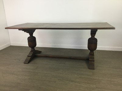 Lot 418 - AN OAK REFECTORY STYLE DINING TABLE