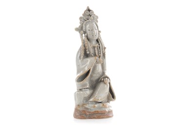 Lot 1244 - A SMALL CHINESE CELADON GLAZED POTTERY FIGURE OF GUANYIN