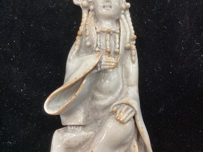 Lot 1244 - A SMALL CHINESE CELADON GLAZED POTTERY FIGURE OF GUANYIN