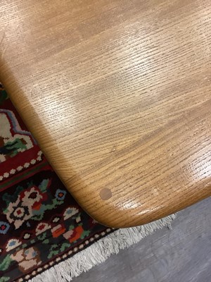 Lot 404 - AN ERCOL 'PANDORA'S BOX' GOLDEN ELM COFFEE TABLE