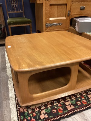 Lot 404 - AN ERCOL 'PANDORA'S BOX' GOLDEN ELM COFFEE TABLE