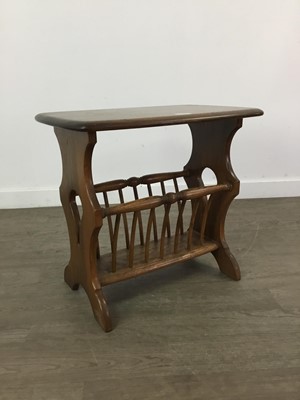 Lot 408 - AN ERCOL STAINED ELM MAGAZINE TABLE