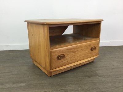 Lot 409 - AN ERCOL GOLDEN ELM TELEVISION UNIT