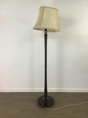 Lot 593 - A MAHOGANY FLOOR LAMP WITH SHADE