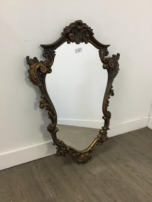 Lot 560 - A FRAMED WALL MIRROR