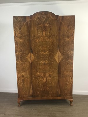 Lot 561 - A WALNUT BEDROOM SUITE