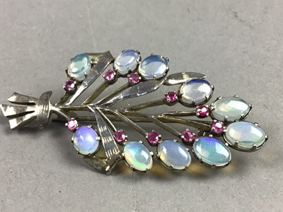 Lot 625 - A BURMESE WHITE METAL FLORAL BROOCH