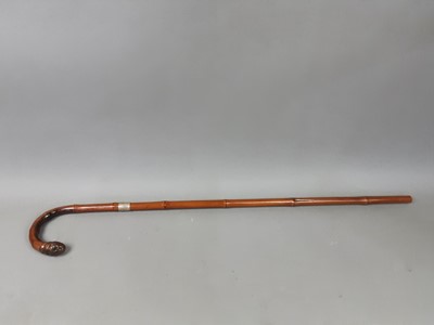 Lot 575 - A GROUP OF NINE WALKING STICKS AND CANES