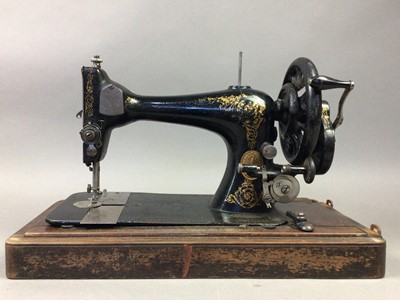 Lot 640 - A VINTAGE SINGER PORTABLE SEWING MACHINE