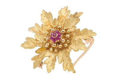 Lot 653 - A RUBY FLOWER BROOCH