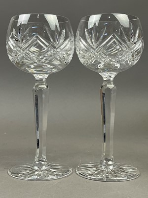 Lot 580 - A SET OF TWELVE CRYSTAL HOCK GLASSES AND OTHER CRYTSAL GLASSES