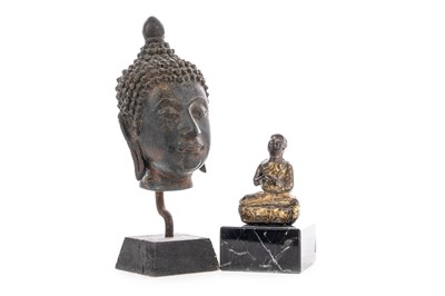 Lot 1252 - A THAI COPPER ALLOY BUST OF THE BUDDHA AND A SMALL GILT STATUE OF AN ASCETIC MONK