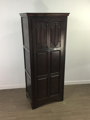 Lot 641 - AN OAK HALL WARDROBE