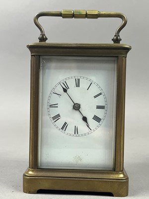 Lot 648 - AN EARLY 20TH CENTURY BRASS CARRIAGE CLOCK AND ANOTHER