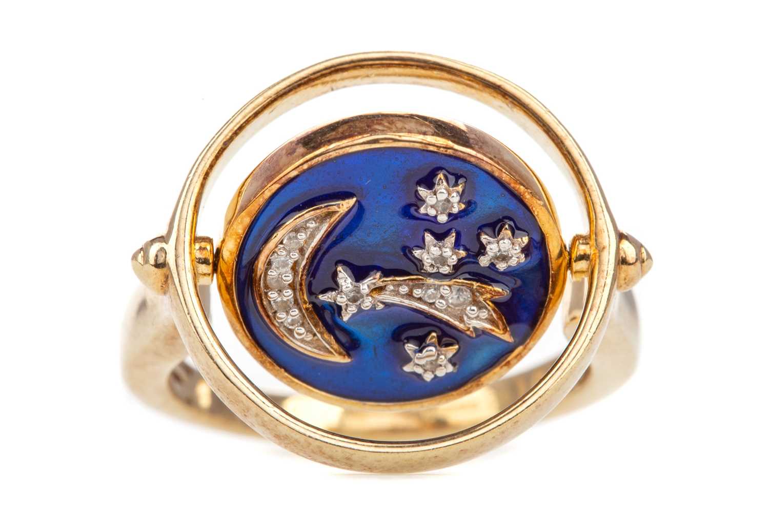 Lot 665 - A GOLD PLATED ENAMELLED SWIVEL RING