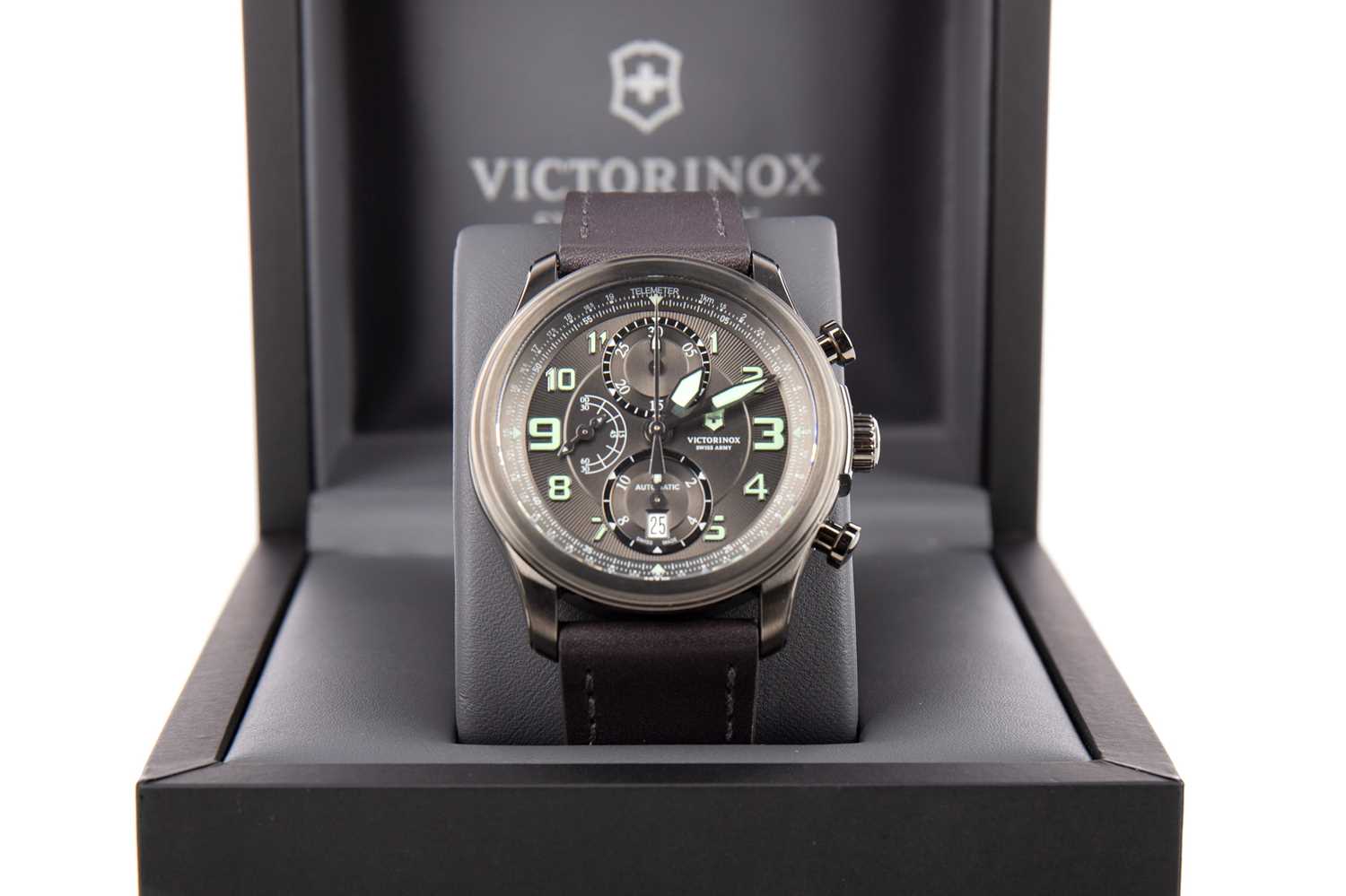 Lot 864 - A VICTORINOX SWISS ARMY GREY STEEL AUTOMATIC WRIST WATCH
