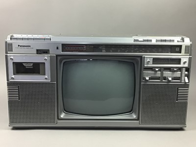 Lot 14 - A PANASONIC PORTABLE TV WITH STEREO CASSETTE RECORDER