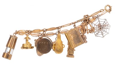 Lot 689 - A GOLD CHARM BRACELET