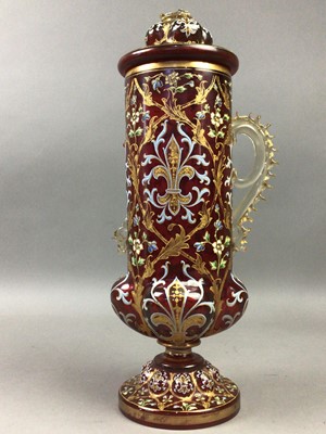 Lot 77 - A 19TH CENTURY BOHEMIAN RUBY GLASS VASE AND COVER