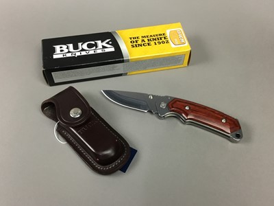 Lot 124 - A BUCK ALPHA HUNTER 277 FOLDING KNIFE