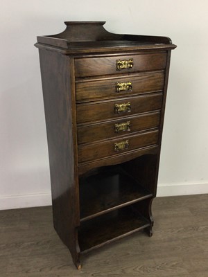 Lot 160 - AN EDWARDIAN STAINED OAK MUSIC CABINET