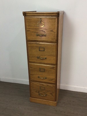 Lot 149 - AN OAK FOUR DRAWER FILING CABINET