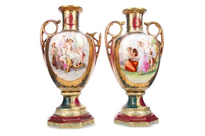 Lot 752 - A PAIR OF LATE 19TH/EARLY 20TH CENTURY CONTINENTAL PORCELAIN TWIN HANDLED VASES