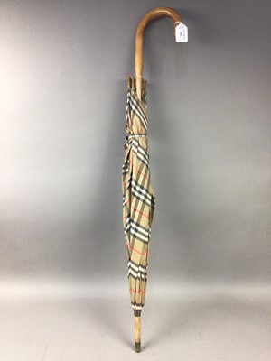 Lot 102 - A BURBERRY UMBRELLA, BRASS WARE AND CANDLESTICKS