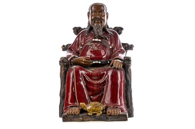 Lot 1156 - A LARGE CHINESE EARTHENWARE FIGURE OF A SEATED EMPEROR