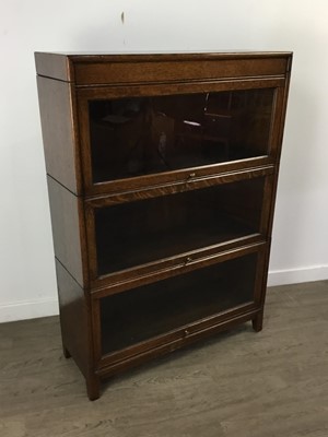 Lot 266 - A THREE TIER OAK STACKING BOOKCASE