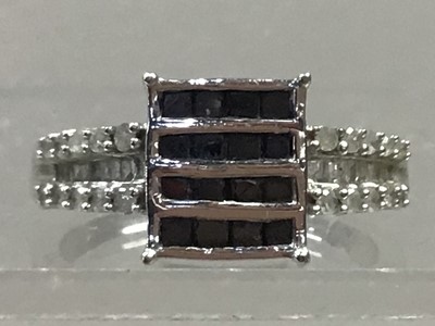 Lot 346 - FOUR BLACK MOISSANITE RINGS