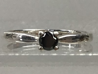 Lot 348 - A DIAMOND DRESS RING AND A BLACK MOISSANITE SOLITAIRE RING