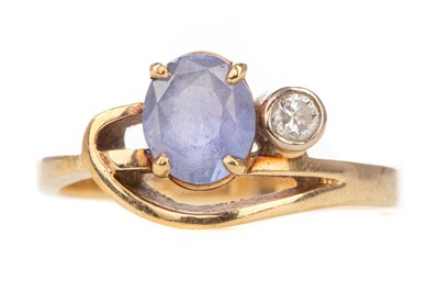 Lot 574 - A TANZANITE AND DIAMOND RING