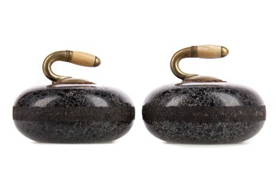 Lot 176 - A PAIR OF EARLY 20TH CENTURY MINIATURE CURLING STONE DESK WEIGHTS