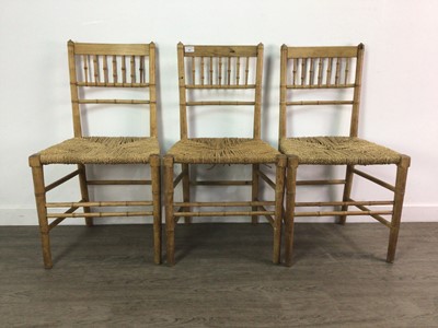 Lot 665 - THREE FAUX BAMBOO AND STRAW SEATED SIDE CHAIRS OF REGENCY DESIGN