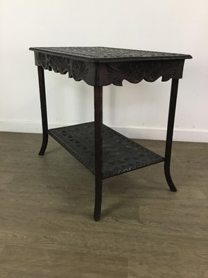 Lot 285 - A VICTORIAN STAINED AND CARVED TWO TIER OCCASIONAL TABLE