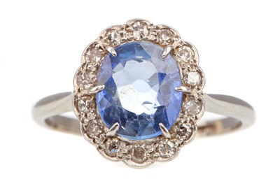 Lot 759 - A SAPPHIRE AND DIAMOND CLUSTER RING