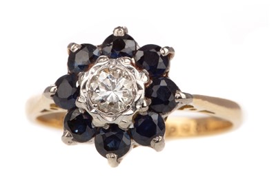 Lot 760 - A SAPPHIRE AND DIAMOND FLOWER CLUSTER RING