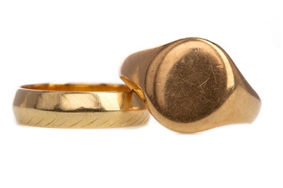 Lot 768 - A GOLD SIGNET RING AND A WEDDING BAND