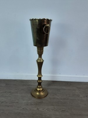 Lot 300 - A FLOOR STANDING BRASS WINE COOLER AND A CANDLEABRUM