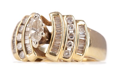 Lot 787 - A DIAMOND DRESS RING