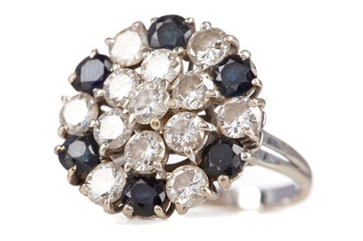 Lot 795 - A SAPPHIRE AND DIAMOND CLUSTER RING