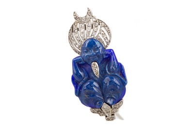 Lot 804 - AN ORNATE FRENCH LAPIS LAZULI AND DIAMOND BUDDHA BROOCH