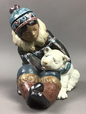 Lot 397 - A LLADRO GROUP OF AN INUIT CHILD AND OTHER LLADRO FIGURES