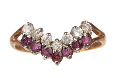 Lot 576 - A RUBY AND DIAMOND WISHBONE RING