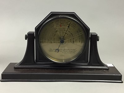 Lot 500 - AN EARLY 20TH CENTURY BAKELITE TABLE BAROMETER AND A FIGURAL LAMP