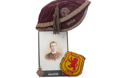 Lot 1495 - ANDREW DONALDSON, S.J.F.A. CAP AND SHIRT CREST, ALONG WITH A MEDAL AND PHOTO